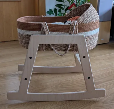 Wooden stand for a doll's cradle