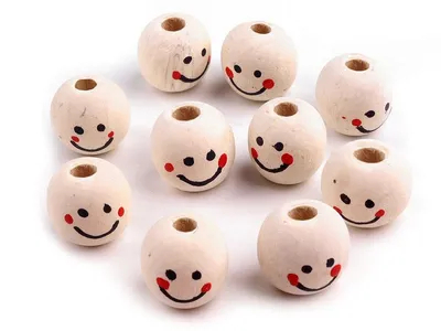 Unvarnished wooden beads with a face Ø18 mm